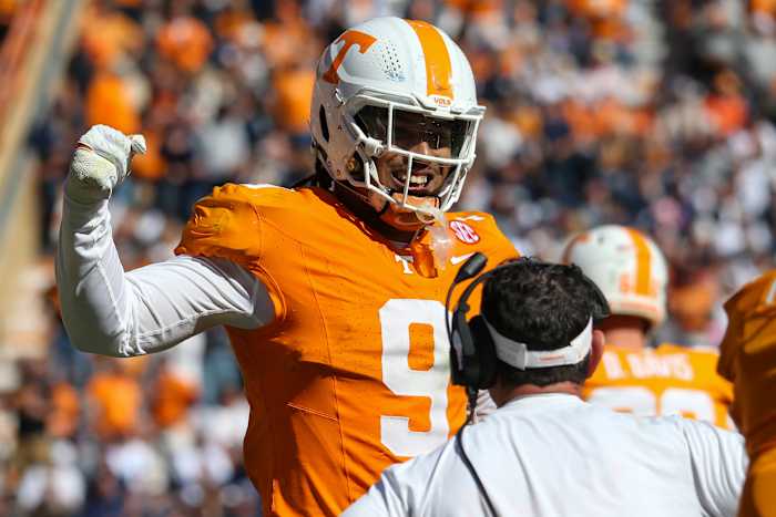 Nov 4, 2023; Knoxville, Tennessee, USA; Tennessee Volunteers defensive lineman Tyler Baron (9) celebrates after returning a fumble for a touchdown against the Connecticut Huskies during the first half at Neyland Stadium. Mandatory Credit: Randy Sartin-USA TODAY Sports